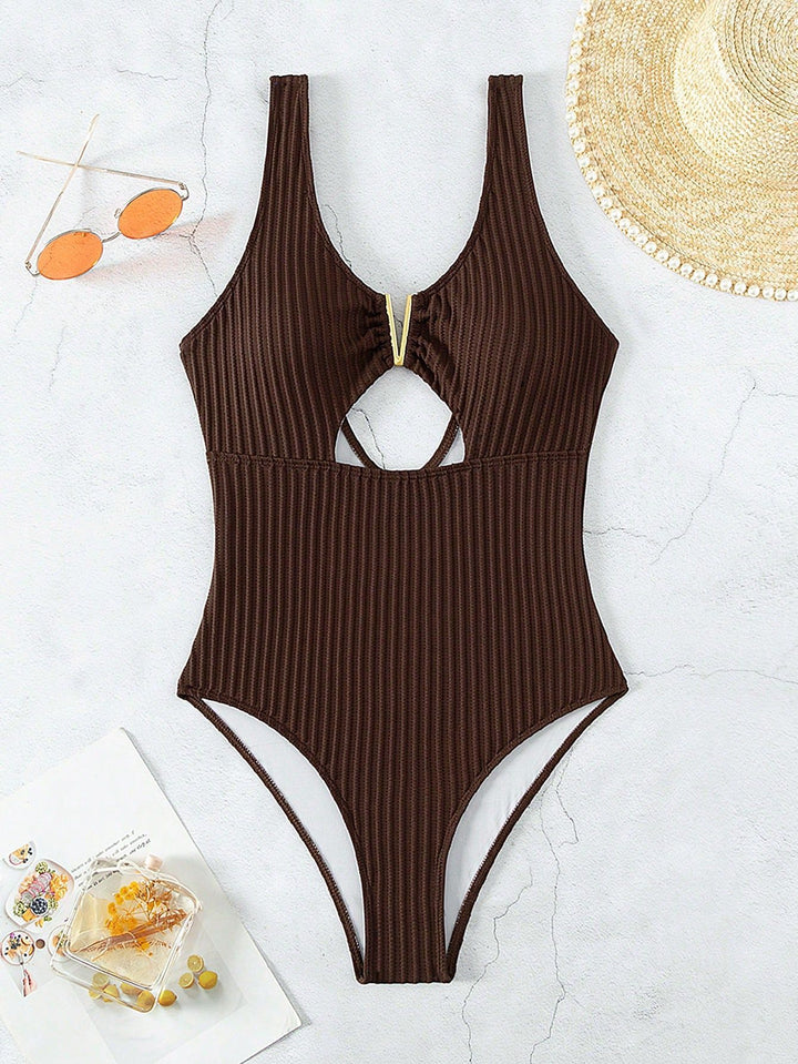 Women's one-piece swimsuit with trendy cut-out and golden accents Mune Fashion