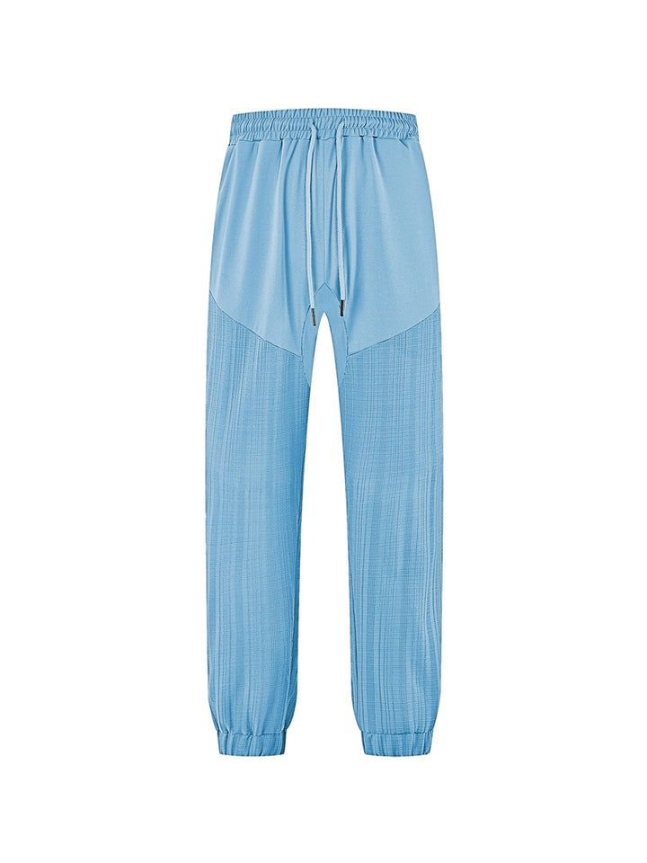 Men's slim-fit jogging pants with elastic drawstring waistband and textured knee panel Mune Fashion
