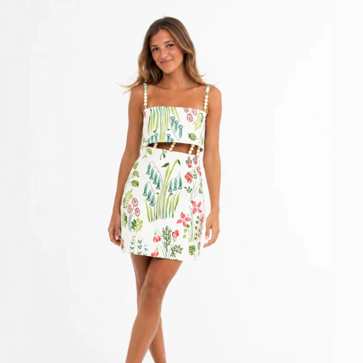 Women's two-piece summer set with pearl straps bandeau top and fitted mini skirt with waist cutout Mune Fashion