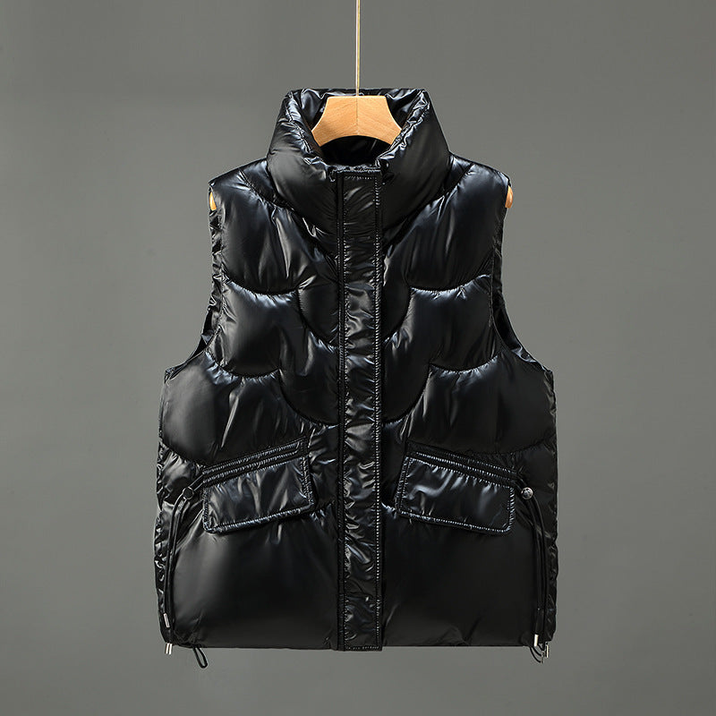 Women's quilted gilet with high stand-up collar, padded, two flap pockets and adjustable hem Mune Fashion