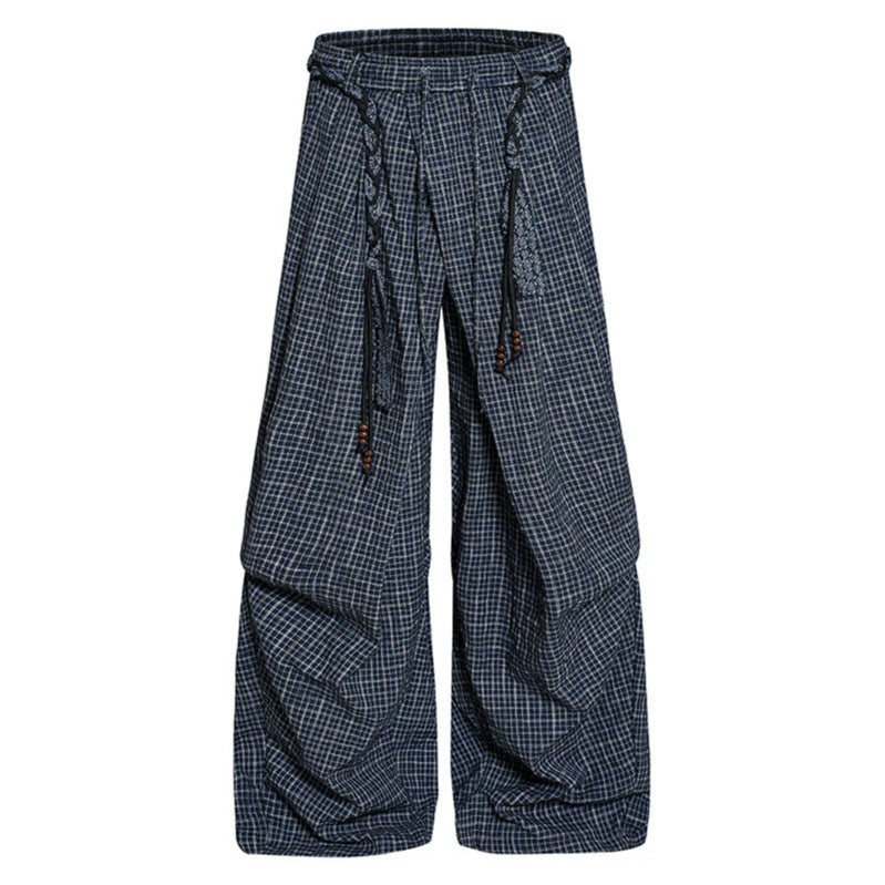 Women's wide palazzo pants with layered pleats, high waistband, and decorative cord belt Mune Fashion