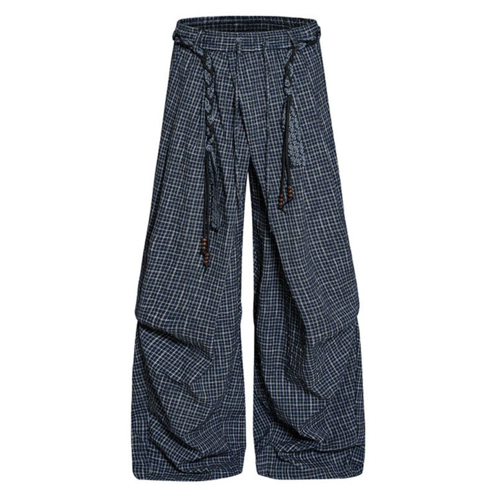 Women's wide palazzo pants with layered pleats, high waistband, and decorative cord belt Mune Fashion