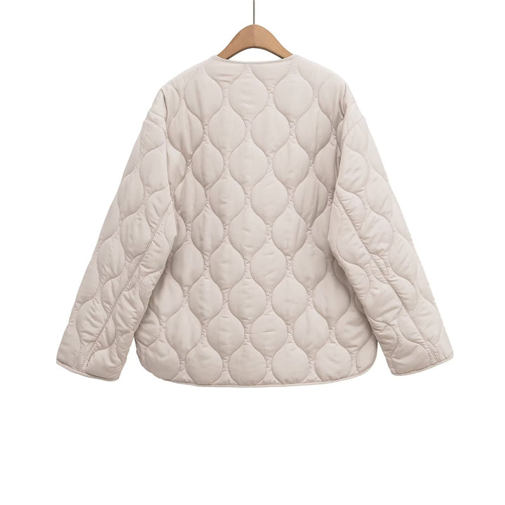 Women's non-quilted oversized quilted jacket with round neckline, full-length zipper, and patch pockets Mune Fashion