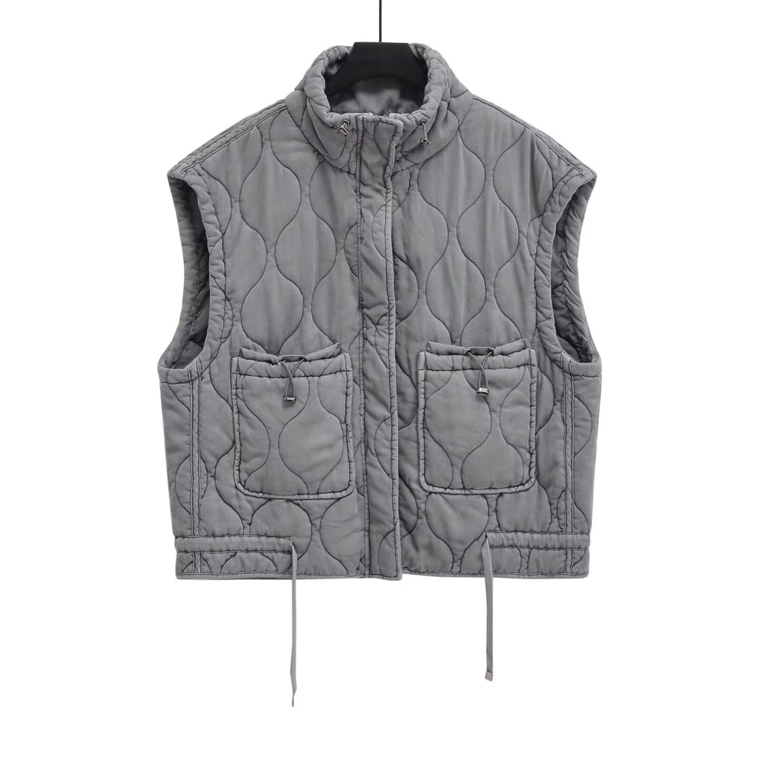 Women 100+ quilted utility vest with stand-up collar, drawstring hem, and patch pockets Mune Fashion