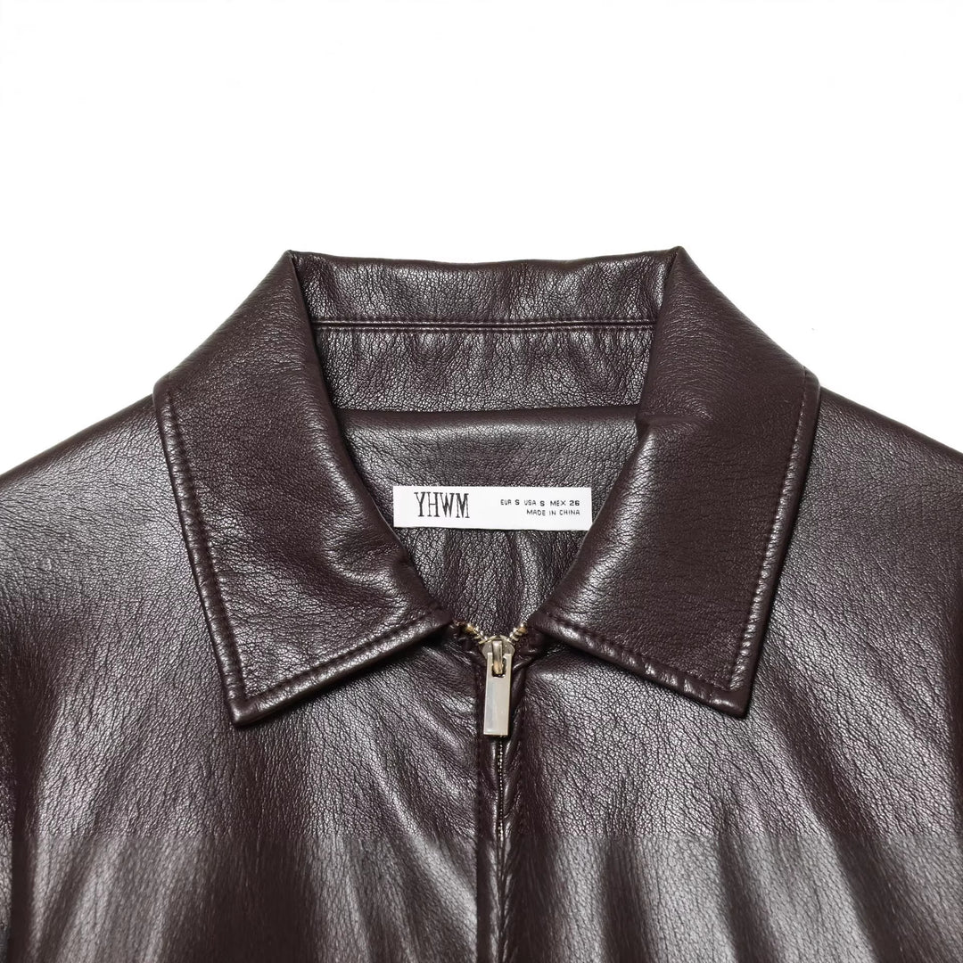 Women's short jacket in vegan leather look with cinching drawstring and flap pockets Mune Fashion