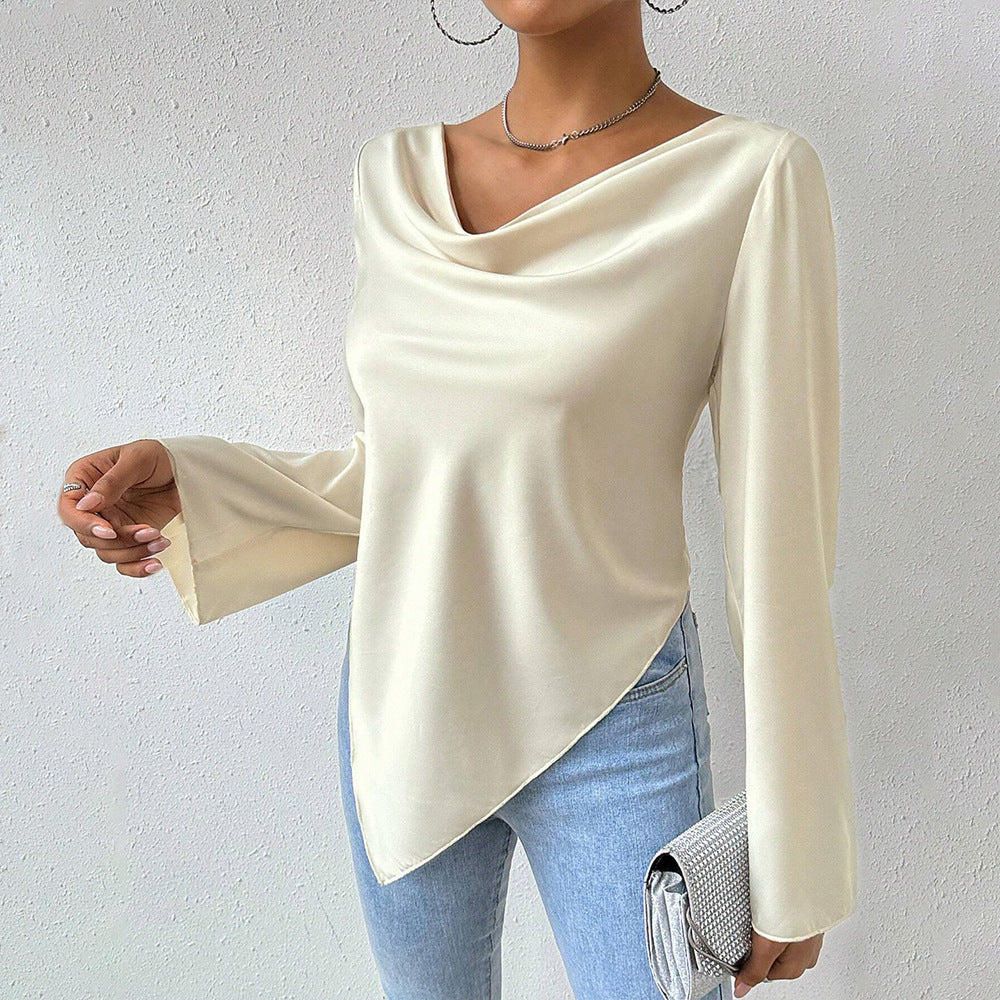 Women's blouse with waterfall neckline, wide trumpet sleeves and flowing satin look.
