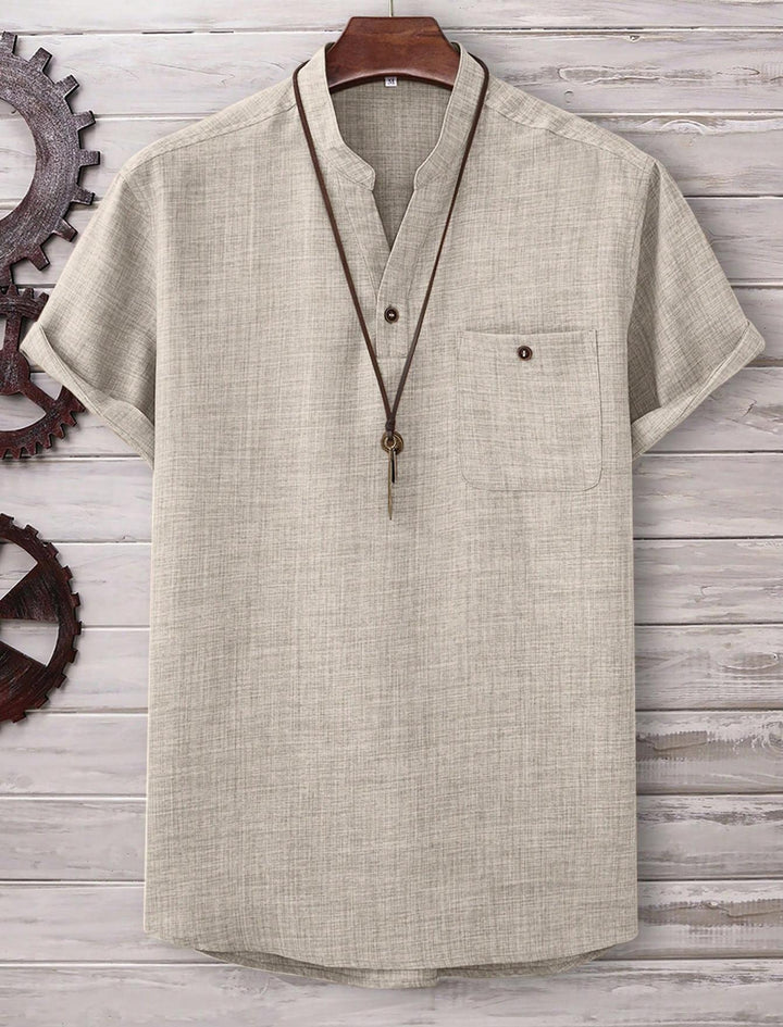 Men's casual Mandarin-style short-sleeve shirt with half-button placket, patch chest pocket, and rounded hem Mune Fashion