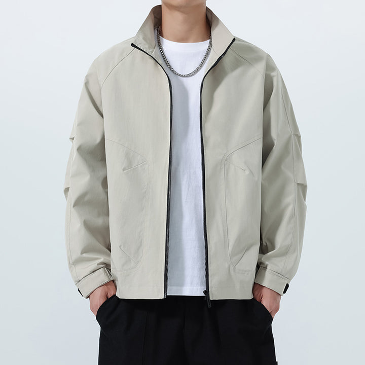 Men's Lightweight Utility Transitional Jacket with Stand Collar, Raglan Sleeves, and Adjustable Velcro Cuffs Mune Fashion