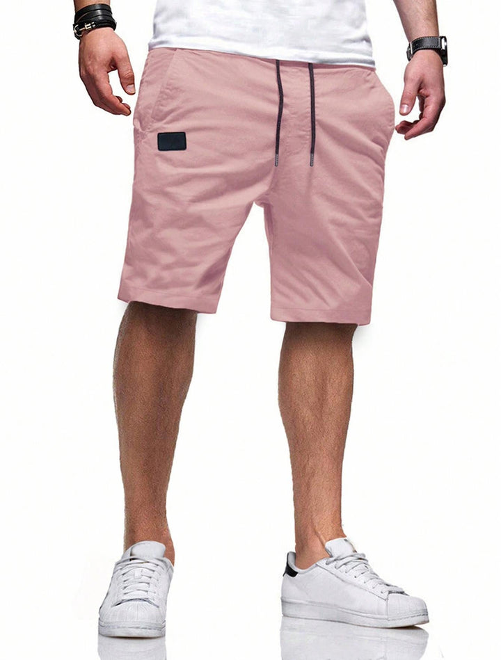Men's comfortable sports shorts with practical pockets and elastic waistband Mune Fashion
