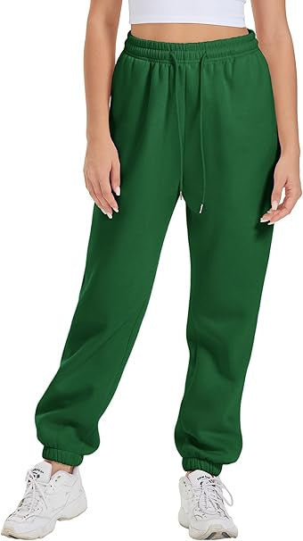 Women's wide High-Waist jogging pants made of soft fleece with elastic waistband, side pockets, and narrow cuffs Mune Fashion