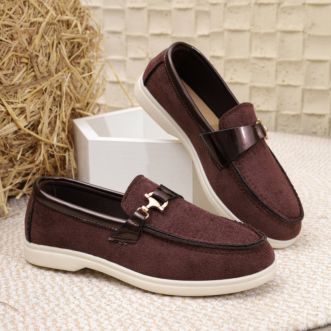 Ladies elegant suede slippers with decorative metal hardware and flexible easy-running sole Mune Fashion