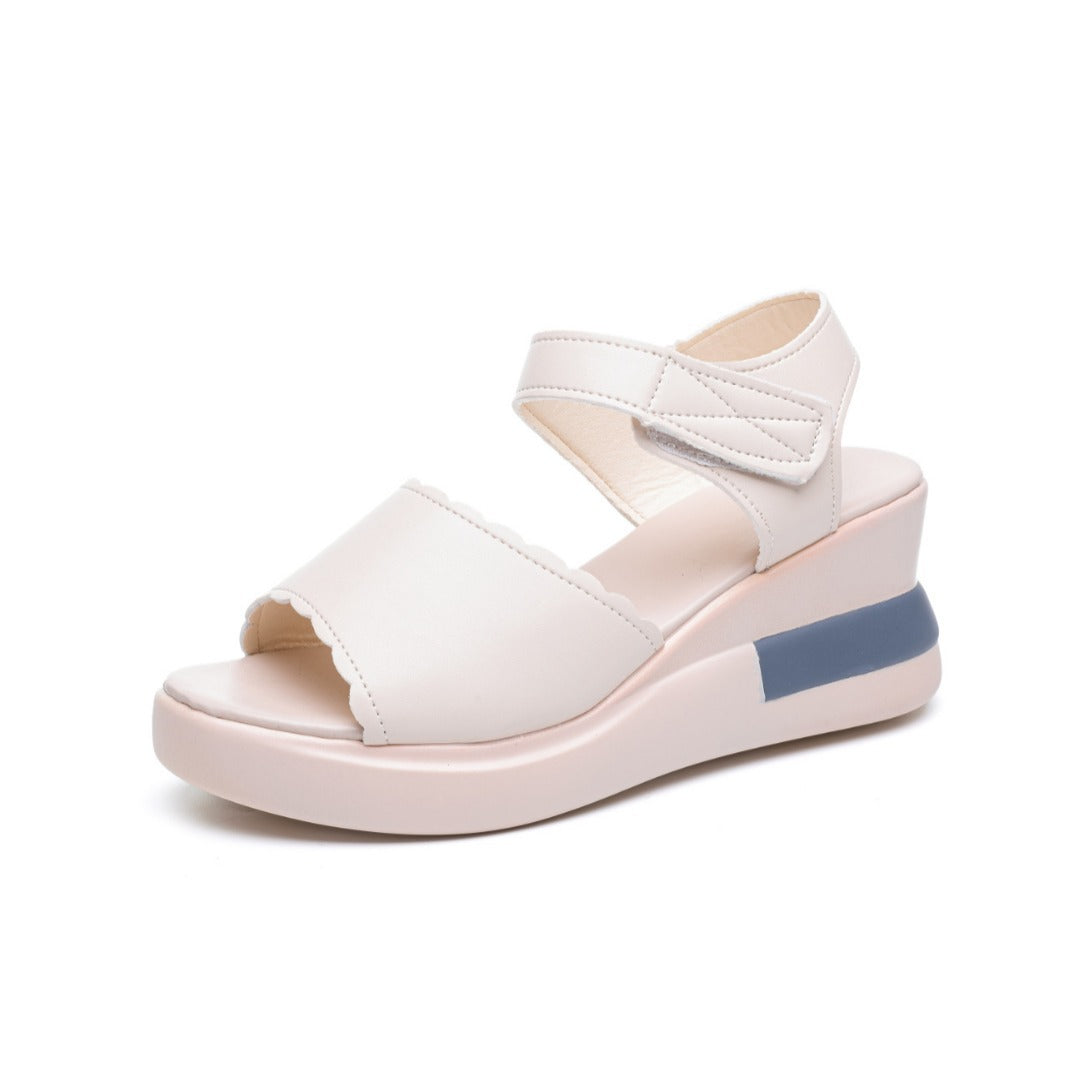 Ladies' platform slide with crossed leather-look straps and ergonomic footbed Mune Fashion