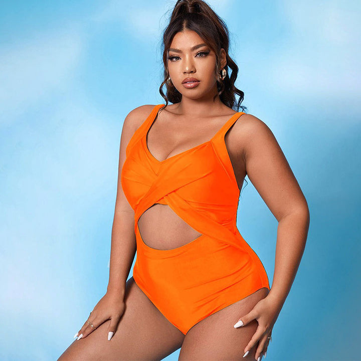 Women’s one-piece swimsuit with asymmetric wrap design and stylish cut-outs