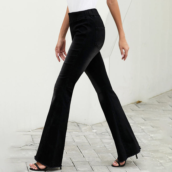 Women's high-waisted flared denim pants with elastic drawstring waistband, decorative seams, and raw hem Mune Fashion
