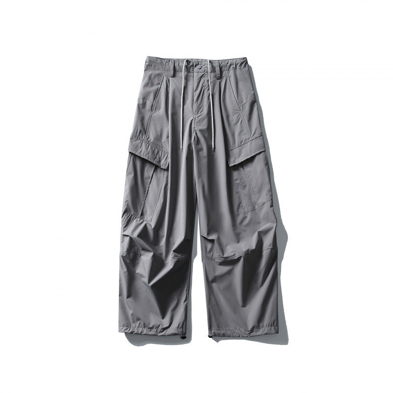 Men's loose technical cargo pants with drawstring waistband and adjustable leg closures Mune Fashion