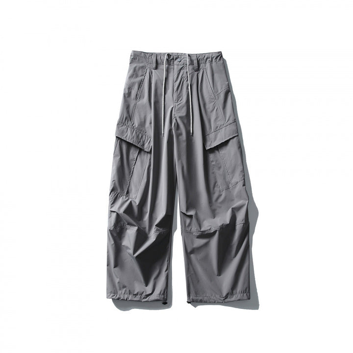 Men's loose technical cargo pants with drawstring waistband and adjustable leg closures Mune Fashion