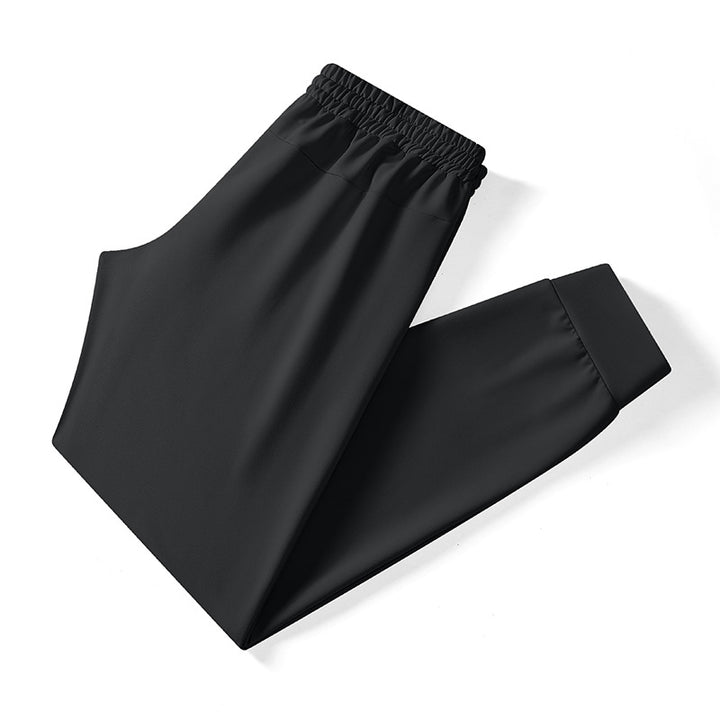 Men's Tech Jogging Pants with elastic drawstring waistband, concealed zipper pockets, and tailored ankle cuffs Mune Fashion