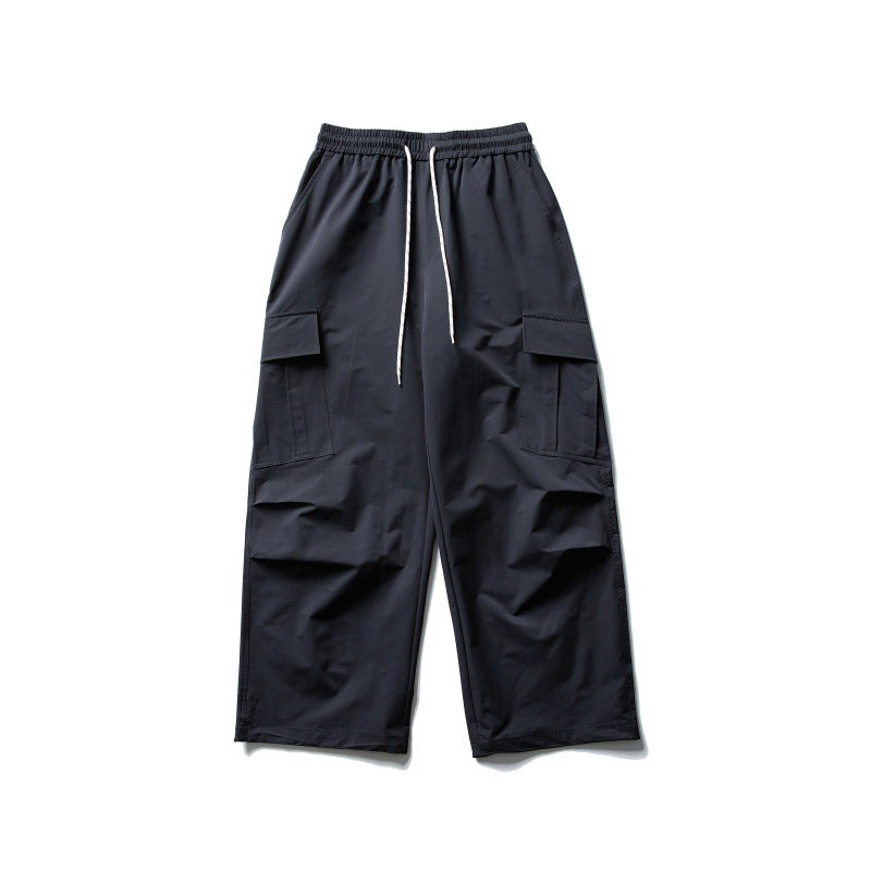 Unisex Wide Cargo Utility Pants in Baggy Cut with Elastic Drawstring Waist and Generous Flap Pockets