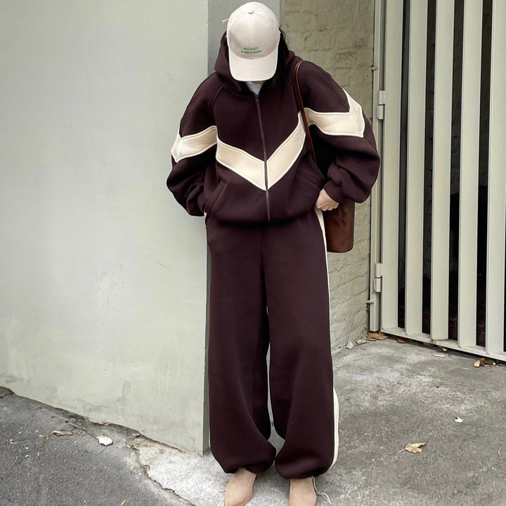 Women's lightweight oversized windbreaker jacket with contrast panels, drawstring hem, and elastic cuffs