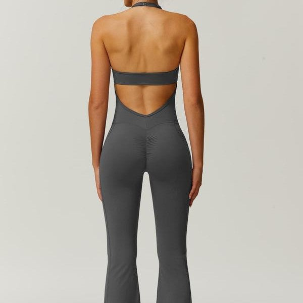 Women's sporty jumpsuit with figure-hugging cut and straps Mune Fashion