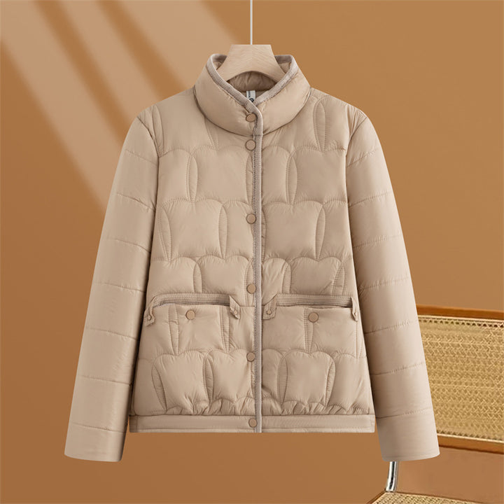 Women's short quilted transitional jacket with stand-up collar and flap pockets Mune Fashion
