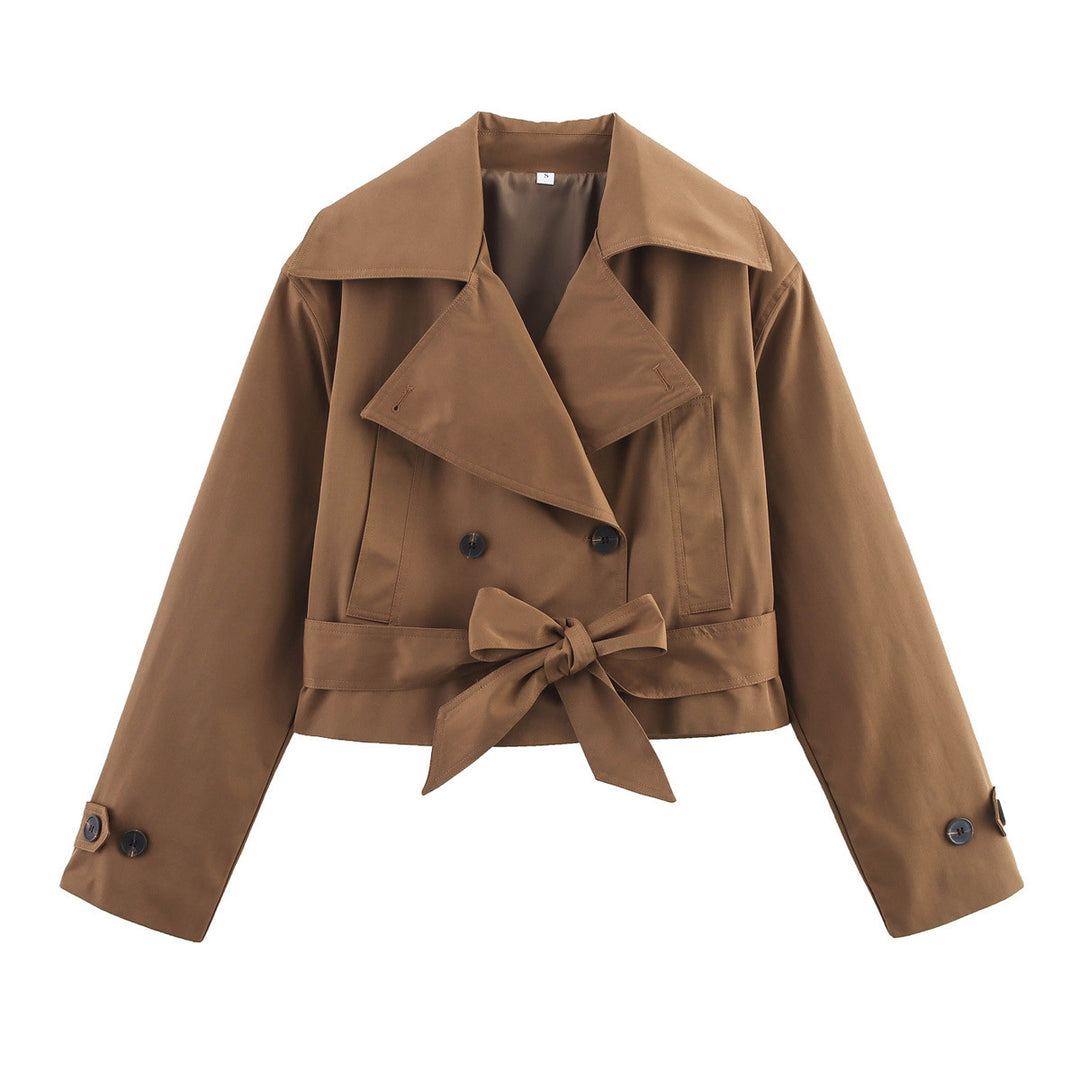 Ladies short waist trench coat with double-breasted button placket, wide shawl collar, and figure-flattering tie belt Mune Fashion