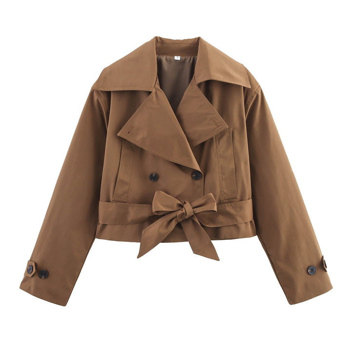 Ladies short waist trench coat with double-breasted button placket, wide shawl collar, and figure-flattering tie belt Mune Fashion