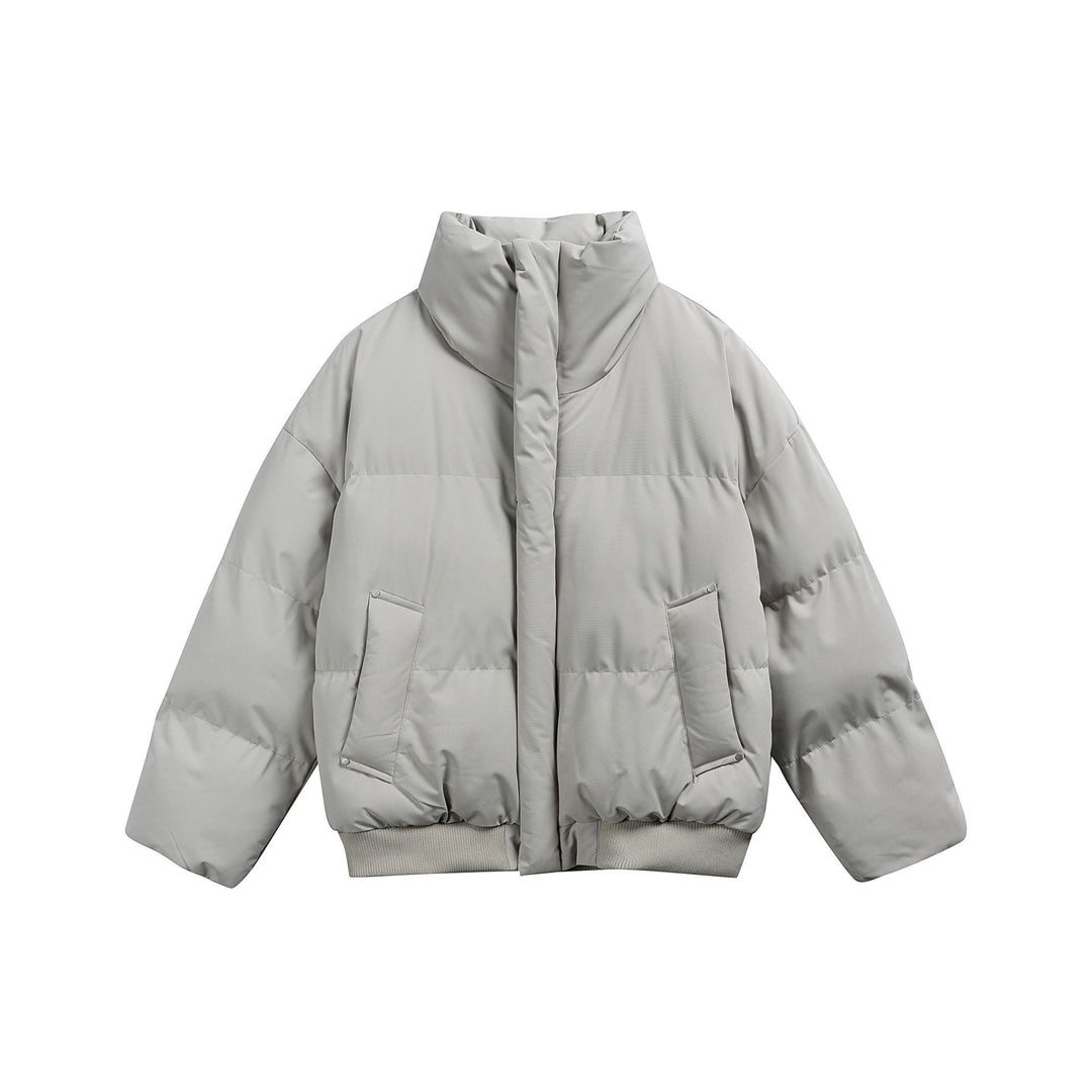 Women's short padded quilted jacket in boxy cut with high stand-up collar and ribbed hem Mune Fashion