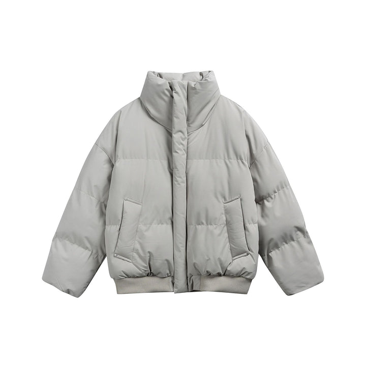 Women's short padded quilted jacket in boxy cut with high stand-up collar and ribbed hem Mune Fashion
