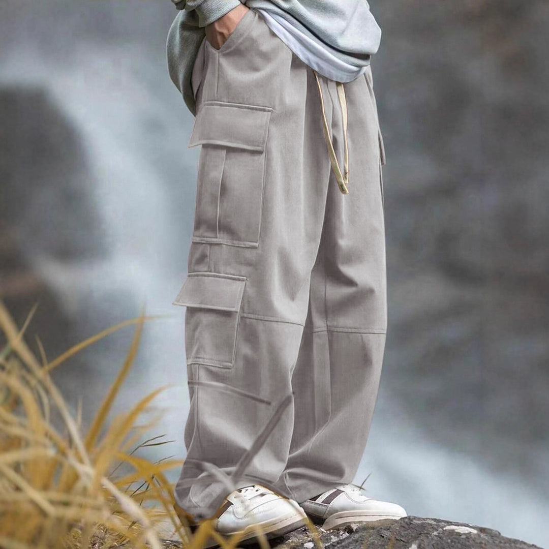 Men's loose cargo pants with multiple pockets, drawstring and reinforced knee areas Mune Fashion