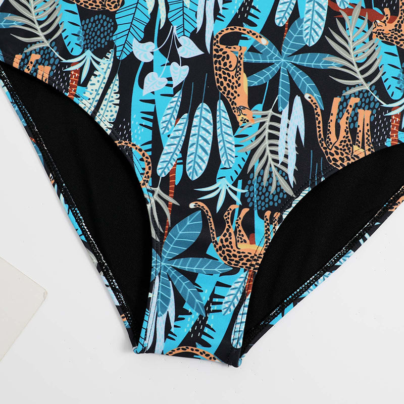 Women's one-piece swimsuit with playful ruffle design and floral wrap skirt Mune Fashion