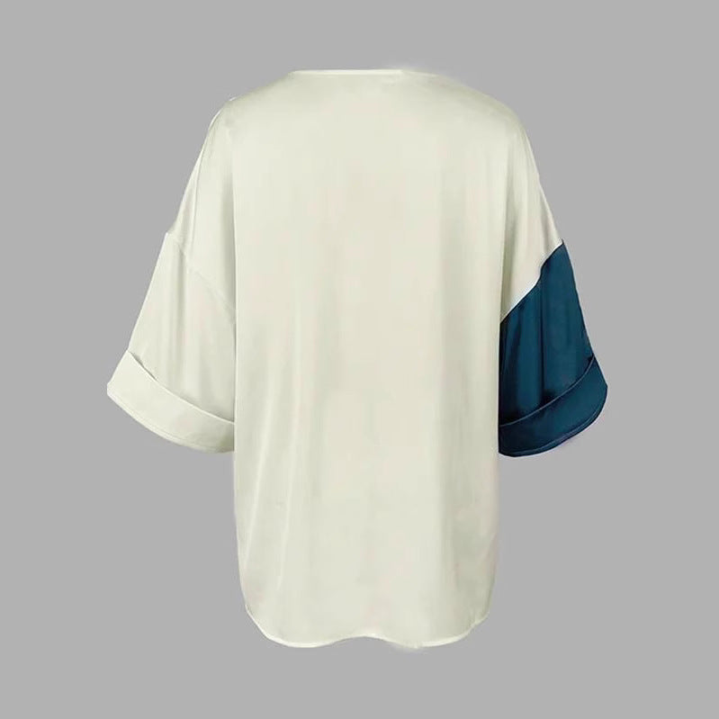 Women's blouse with V-neckline and side gathering cord