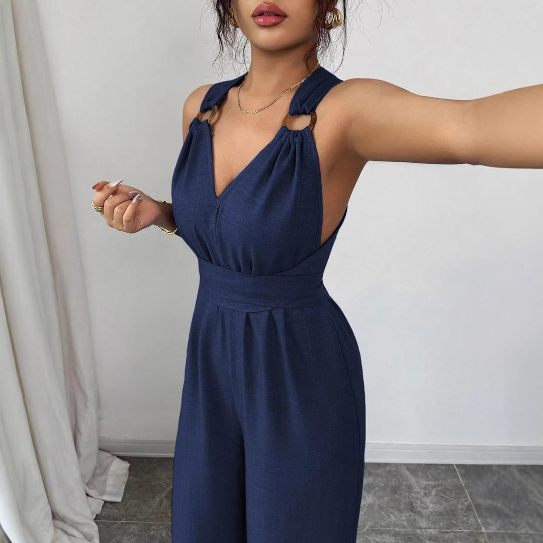 Women’s jumpsuit with wide leg, tailored wrap belt and eyelet straps Mune Fashion