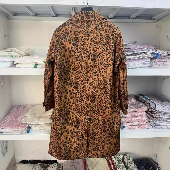 Women's longer satin coat in leopard print with notched collar, concealed button placket, and side pockets Mune Fashion