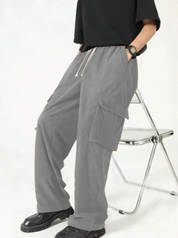 Men's loose wide corduroy cargo pants with drawstring waistband and large flap pockets Mune Fashion
