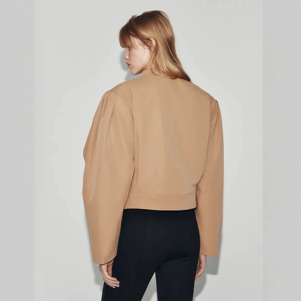 Women's short jacket in a boxy cropped cut with double button placket and structured shoulder pleats Mune Fashion