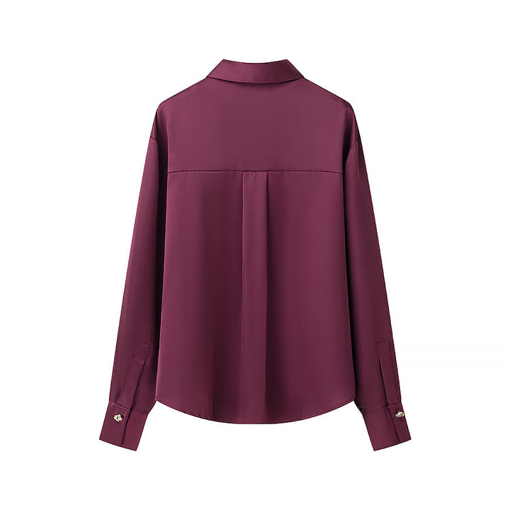 Women's flowing satin blouse with decorative buttons and straight cut Mune Fashion