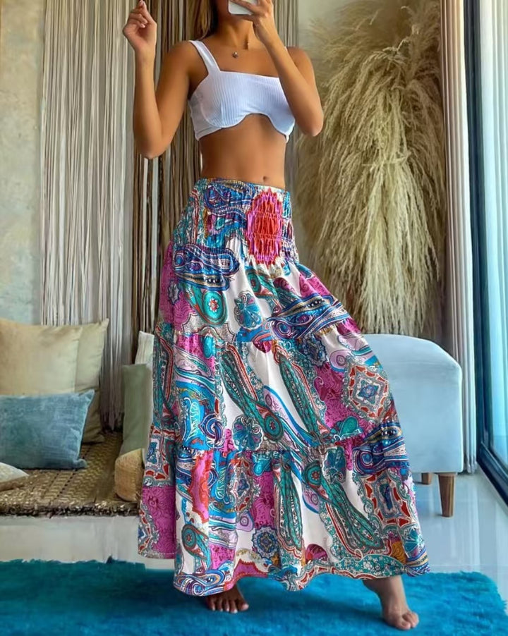 Women's maxi skirt with elastic smocked waistband and flowing paisley print Mune Fashion