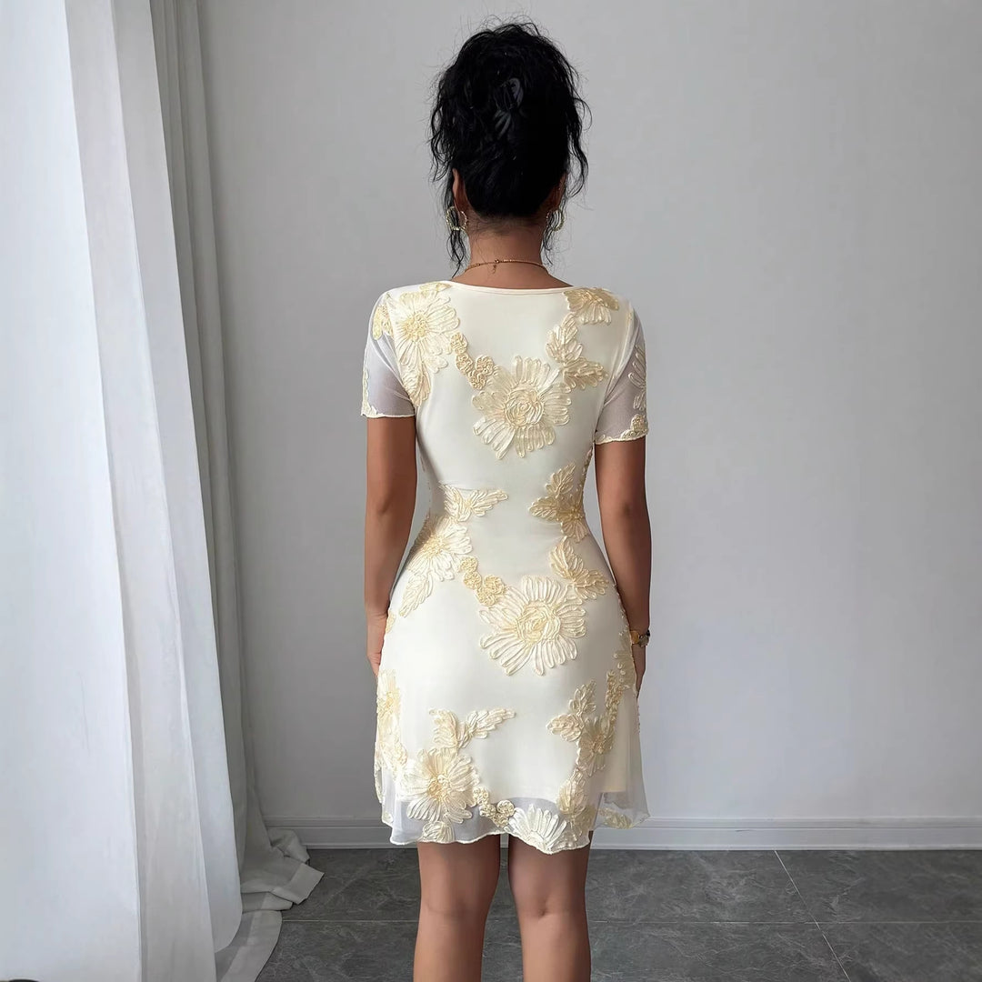 Women's figure-hugging tulle mini dress with three-dimensional flower embroidery, front slit, and short transparent sleeves Mune Fashion