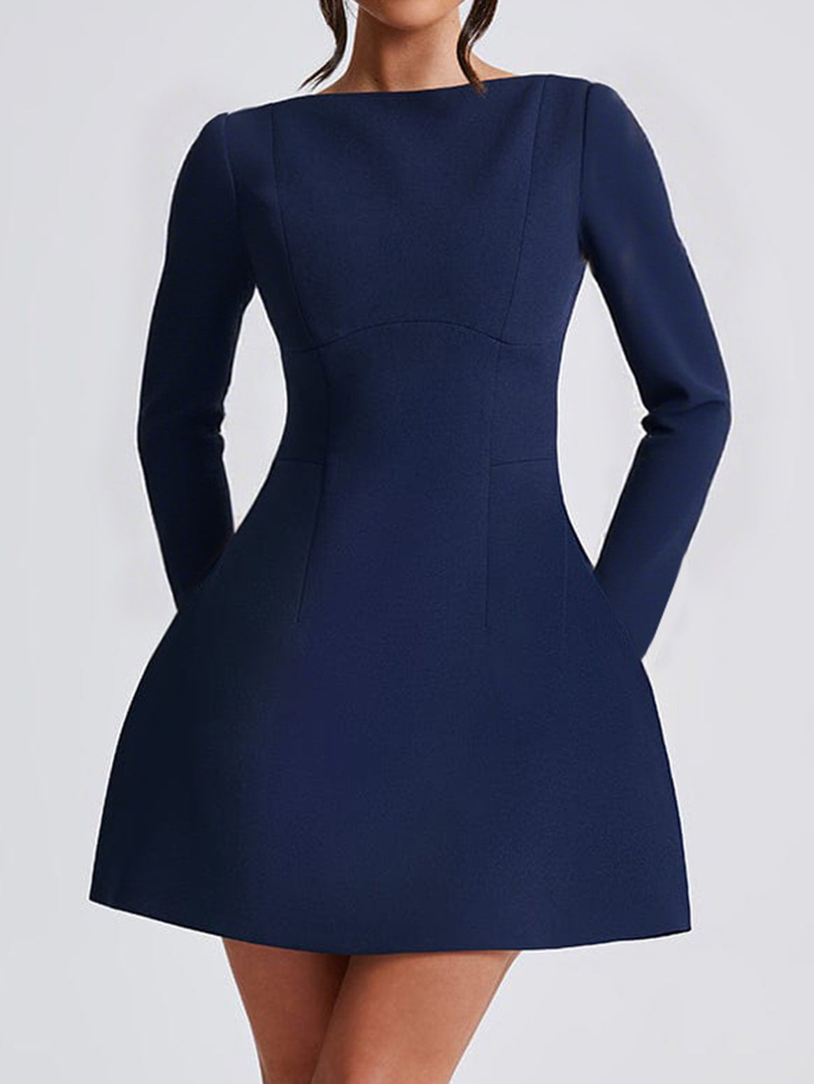 Women's fitted A-line dress with boat neckline, long sleeves and discreet side pockets Mune Fashion
