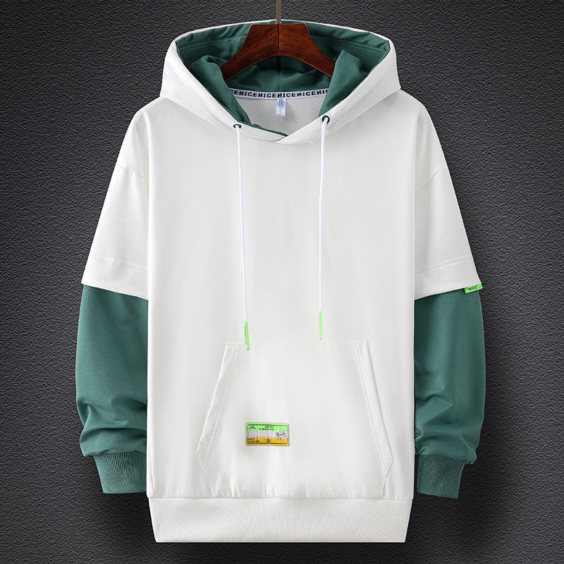 Men's hoodie in layered look with contrast sleeves, kangaroo pocket, and oversized cut Mune Fashion