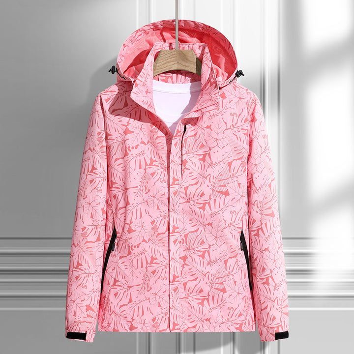Women's lightweight packable rain and wind jacket with hood, leaf pattern and concealed zippers Mune Fashion