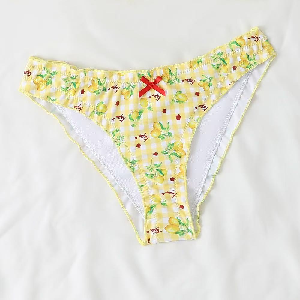 Women’s bikini set with playful lemon pattern and ruffle details Mune Fashion
