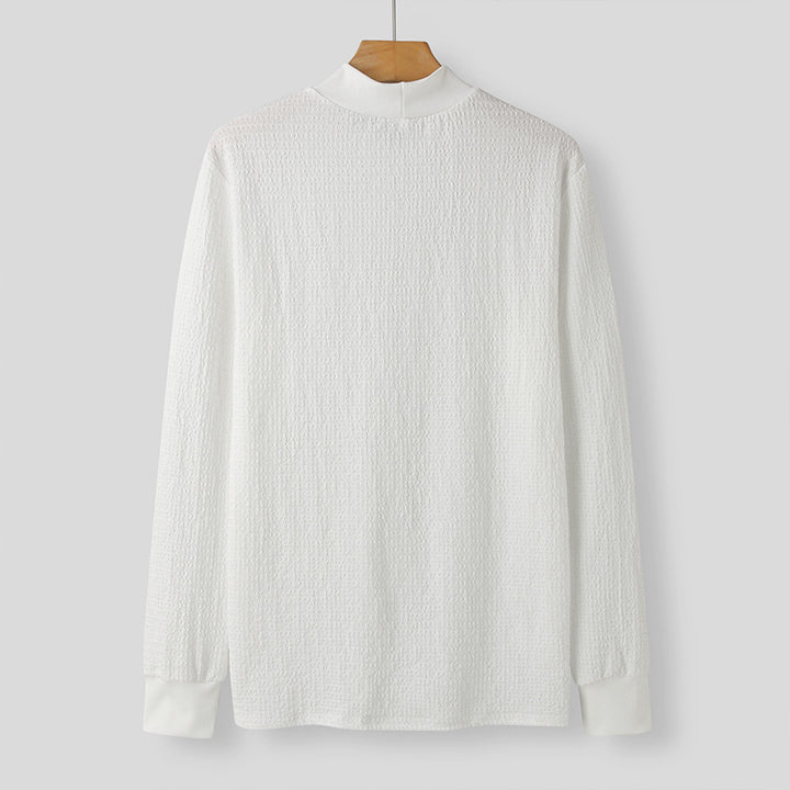 Unisex nano textured waffle knit pullover with slim stand-up collar and ribbed cuffs Mune Fashion