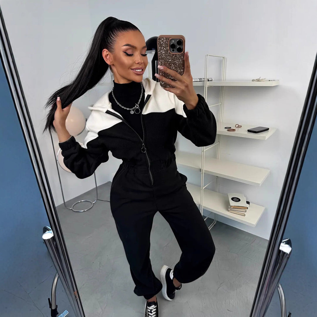 Ladies cozy fleece jumpsuit with hood, full-length zipper and elastic cuffs Mune Fashion