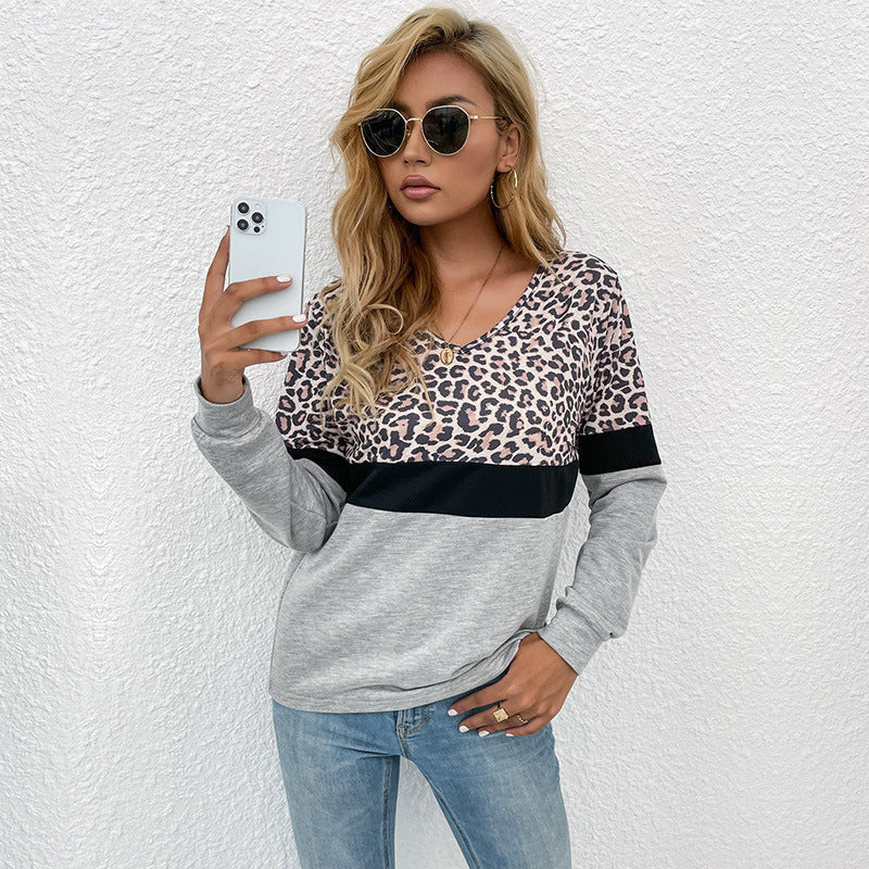 Women's long sleeve shirt with V-neck and leopard print in color block design Mune Fashion