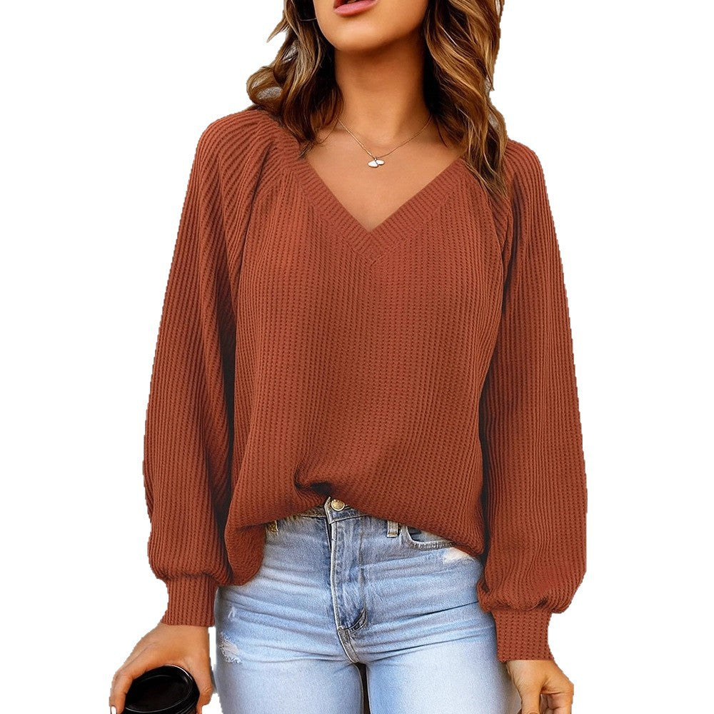 Women's fine structure knit sweater with V-neck, balloon sleeves, and ribbed cuffs Mune Fashion