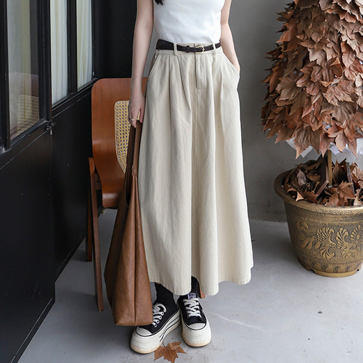 Women's high-waisted A-line maxi skirt with pleated waistband and detachable faux leather belt Mune Fashion