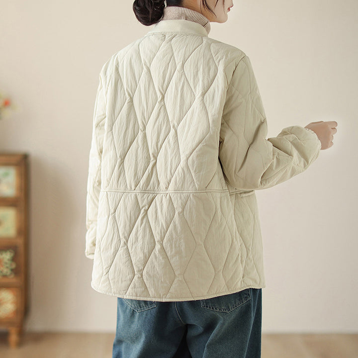 Women's lightweight padded transitional jacket with oversized cut, elastic sleeve cuffs and concealed snap button placket Mune Fashion