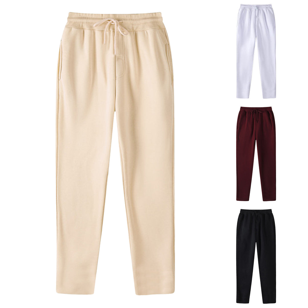 Men's straight-cut sweatpants made of mottled cotton blend with elastic waistband, drawstring, and side pockets Mune Fashion